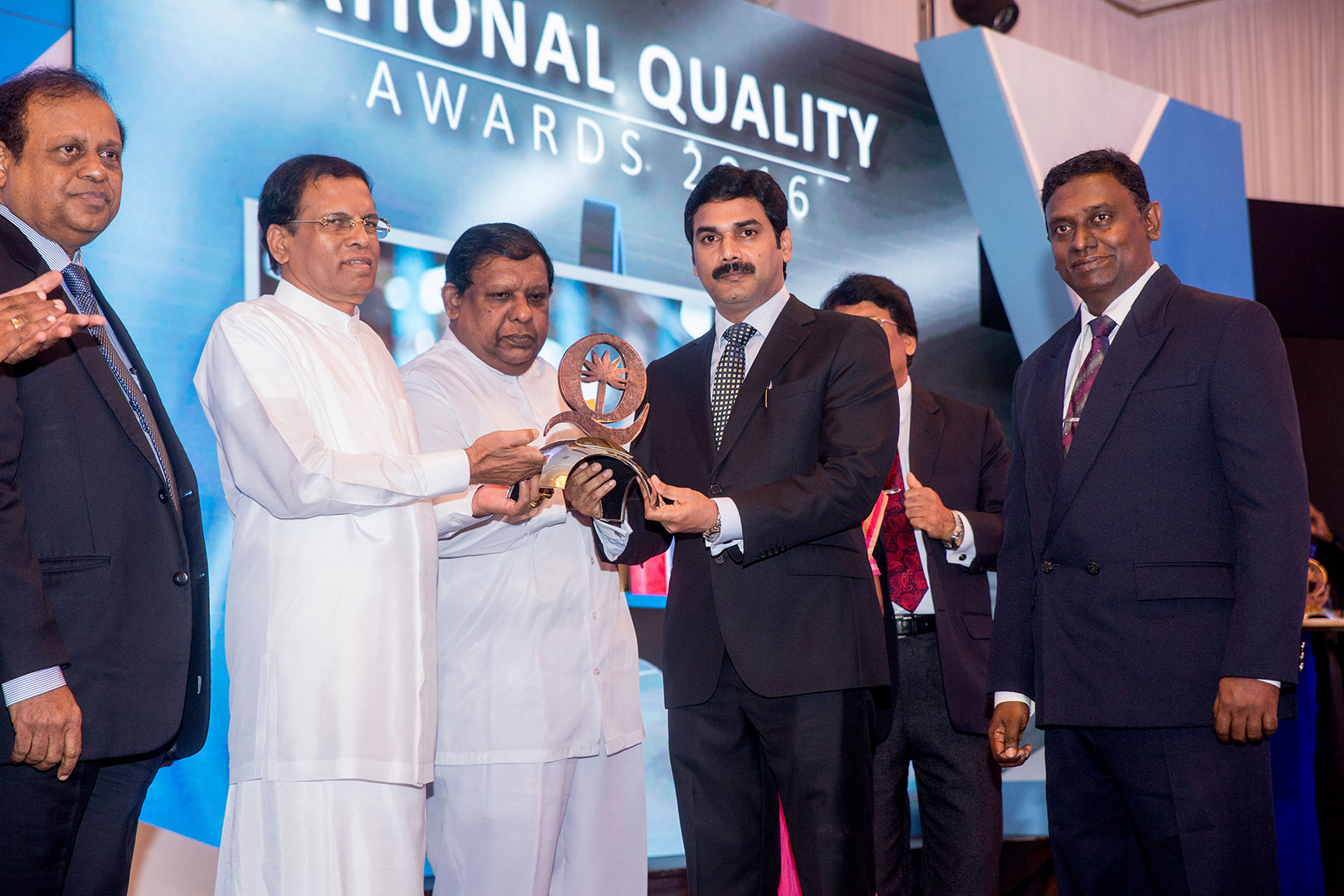 Director/CEO of ABM Mr.M.Ramachandran receives the award from President Maithreepala Sirisena.
